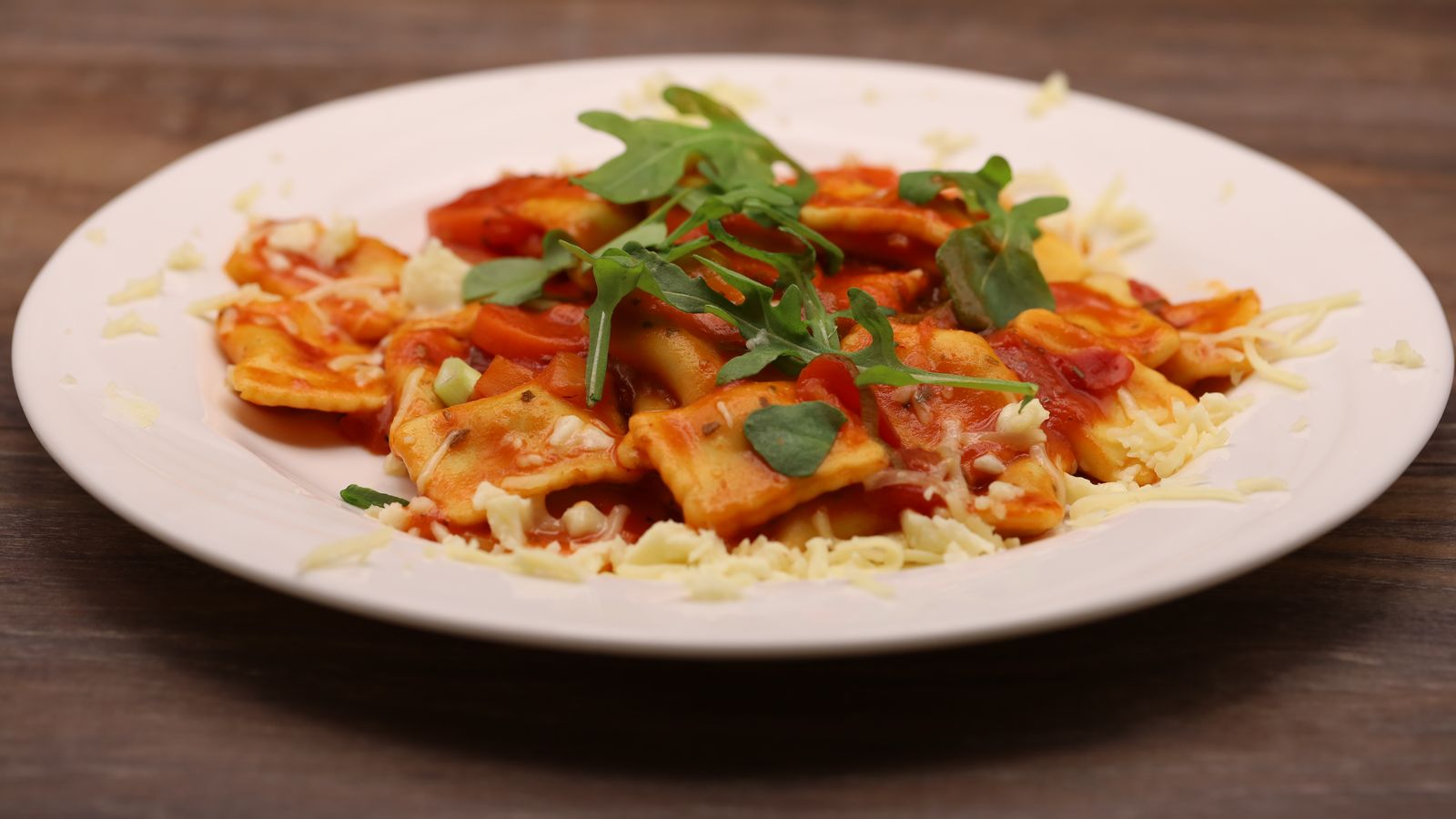 Sheet metal ravioli with mixed vegetables in tomato sauce